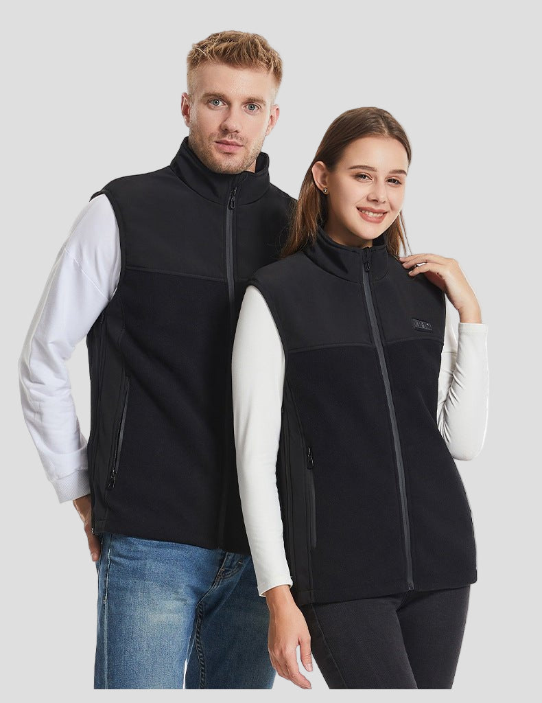 man and woman wearing a 13 Area Black Fleece Heated gilet