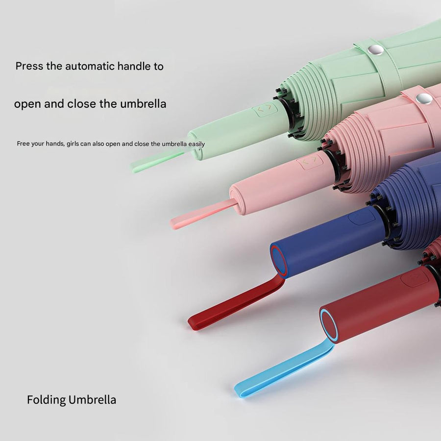 Folding umbrellas in green, pink, blue, and red on a light gray background.