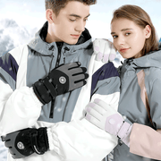 two people wearing Fleece Waterproof Thermal Ski Gloves with snowy background