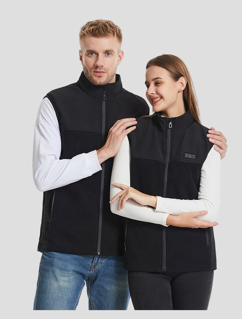 man and woman wearing a 13 Area Black Fleece Heated Vest