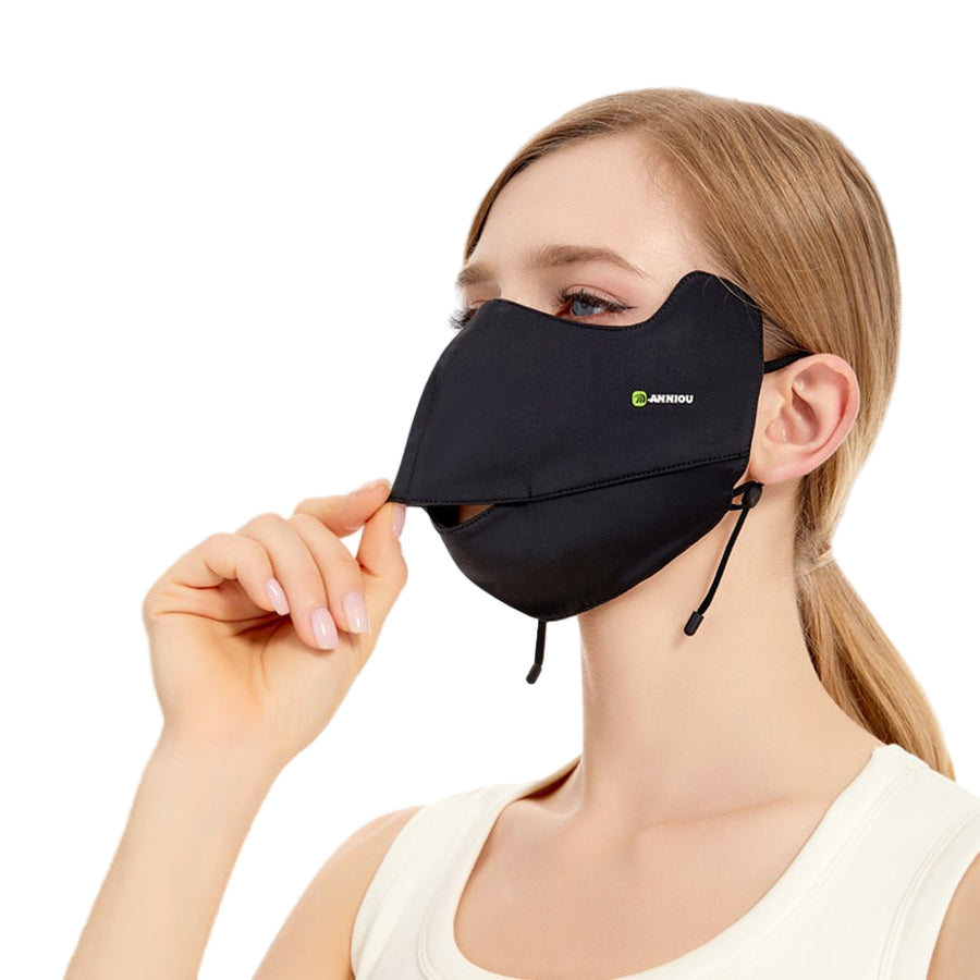 Woman wearing a black face mask with a visible brand logo on a white background