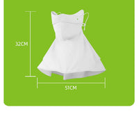 White dress with measurements on a green background