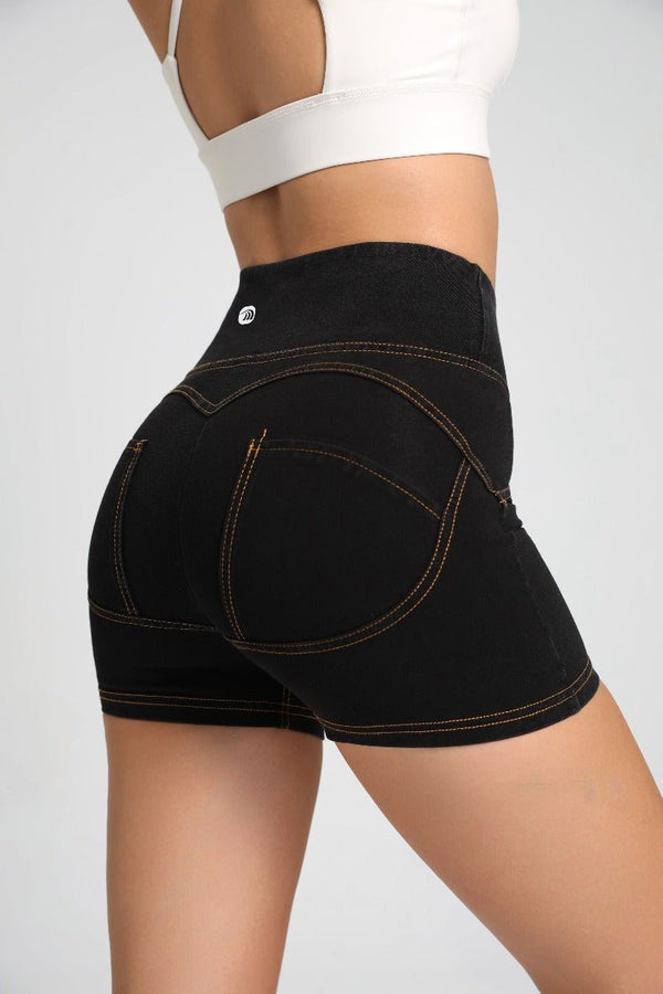 Women's high waist butt lift #Black shorts worn by a woman on a white background