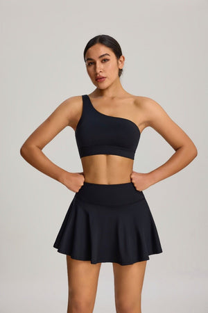 Women's #black one-shoulder sports bra and skirt high waist