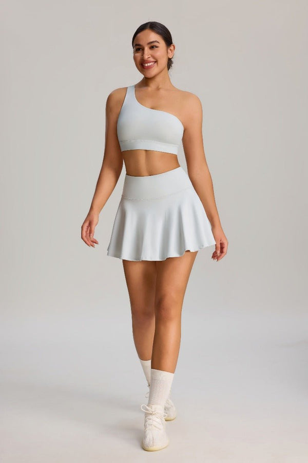 #lightgray one-shoulder sports bra and skirt 
