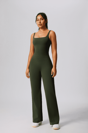 Woman wearing a #green leggings and vest for sports