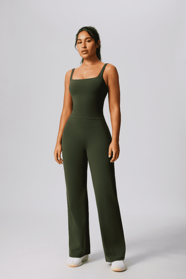 Woman wearing a #green leggings and vest for sports