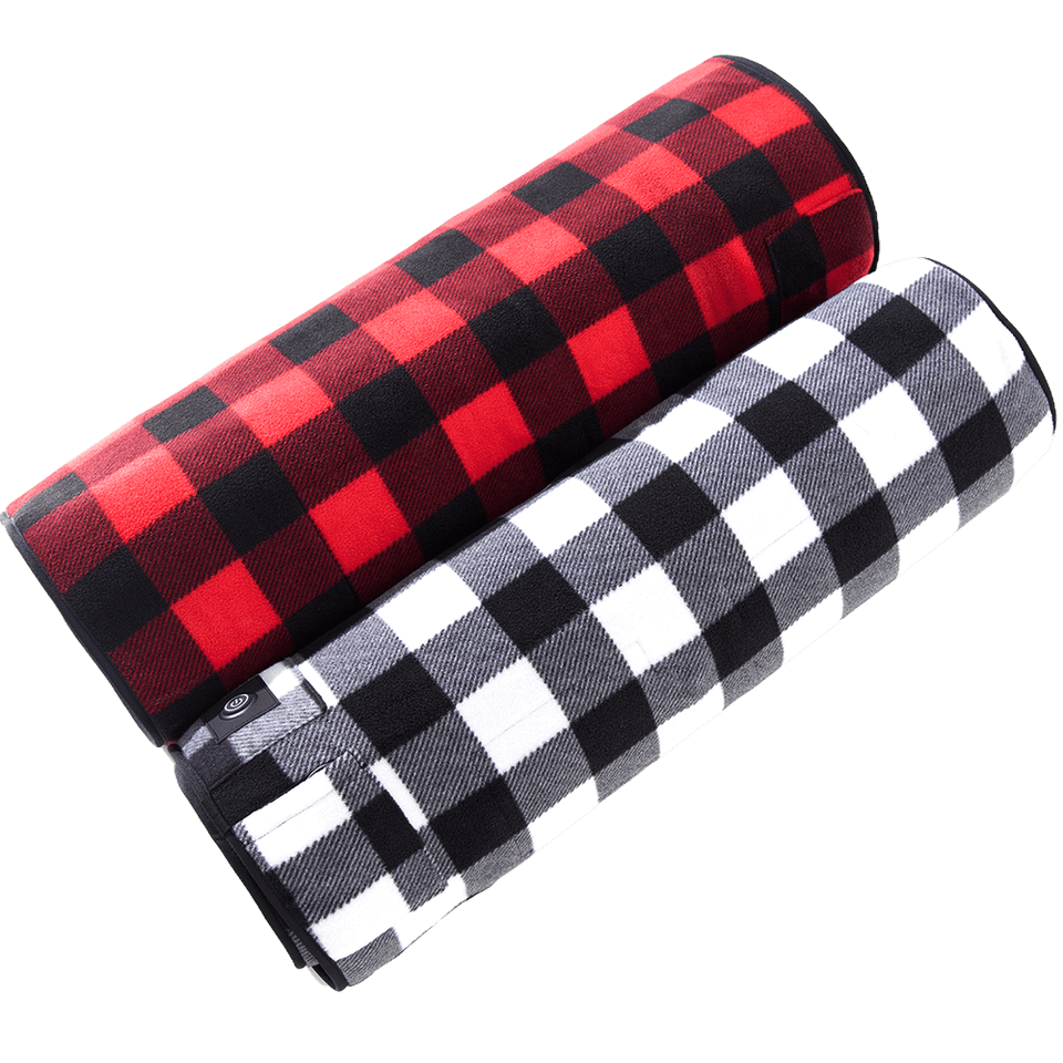 Two checkered rolled heating mats, one red and black, one black and white, on a black background.