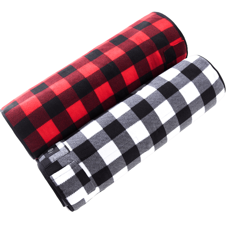 Two checkered rolled heating mats, one red and black, one black and white, on a black background.