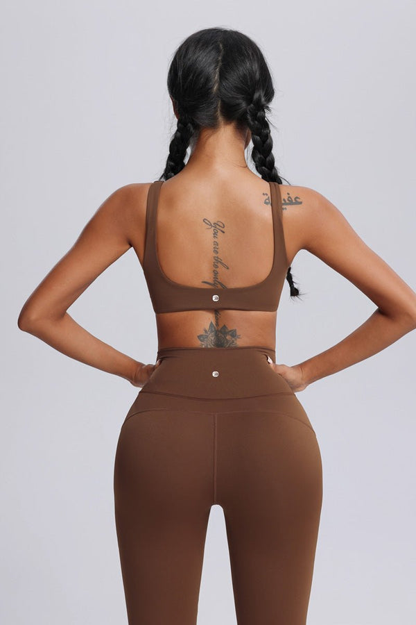 Person wearing a brown sports bra and leggings set by Anniou