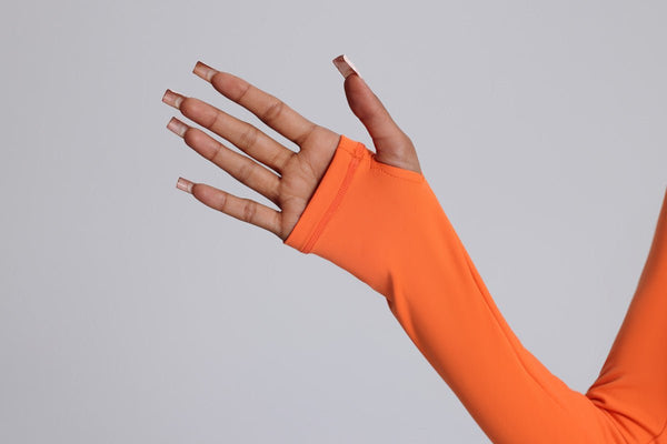 #Orange long-sleeve shirt cuff and thumbhole