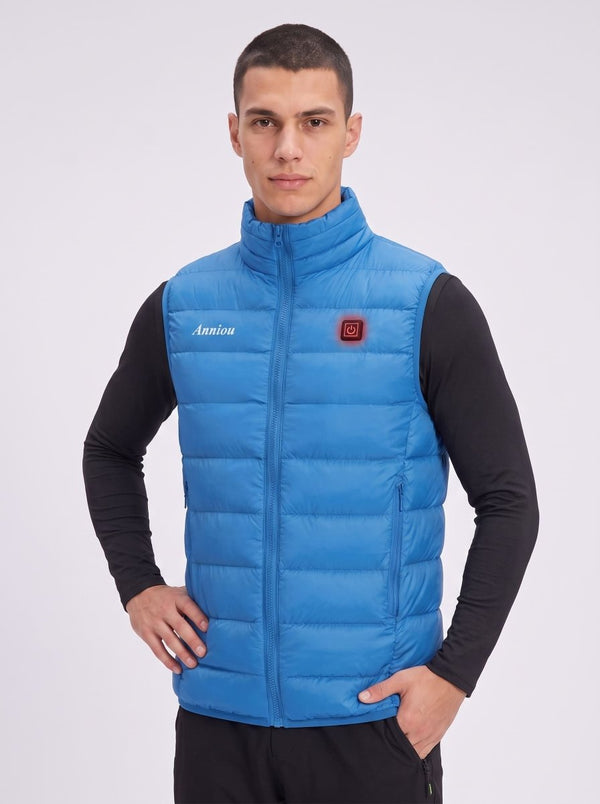 A man wearing a bright blue insulated heated puffer vest over a black long-sleeve shirt, standing against a light gray studio background. The vest has a high collar, front zipper, zip pockets, and a small red square logo patch on the left chest, with the word 'Anniou' printed in white on the right chest.