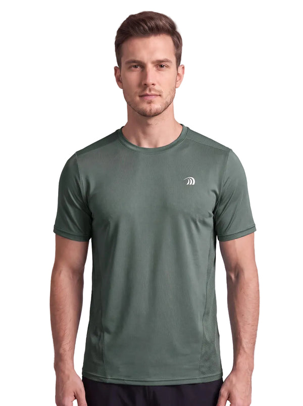 A front-view studio photo of a man wearing a army green athletic T-shirt with a small subtle logo on the left chest, standing against a plain neutral background