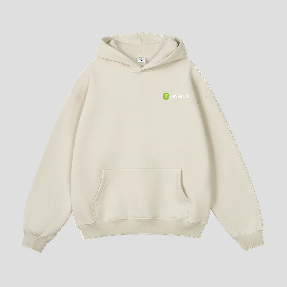 Beige hoodie with Anniou logo on a light beige background