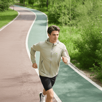 A man is running while wearing an ANNIOU sun-protective hooded jacket