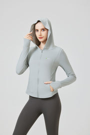 Person wearing a light gray hoodie and dark gray leggings on a white  background Anniou UPF 100 