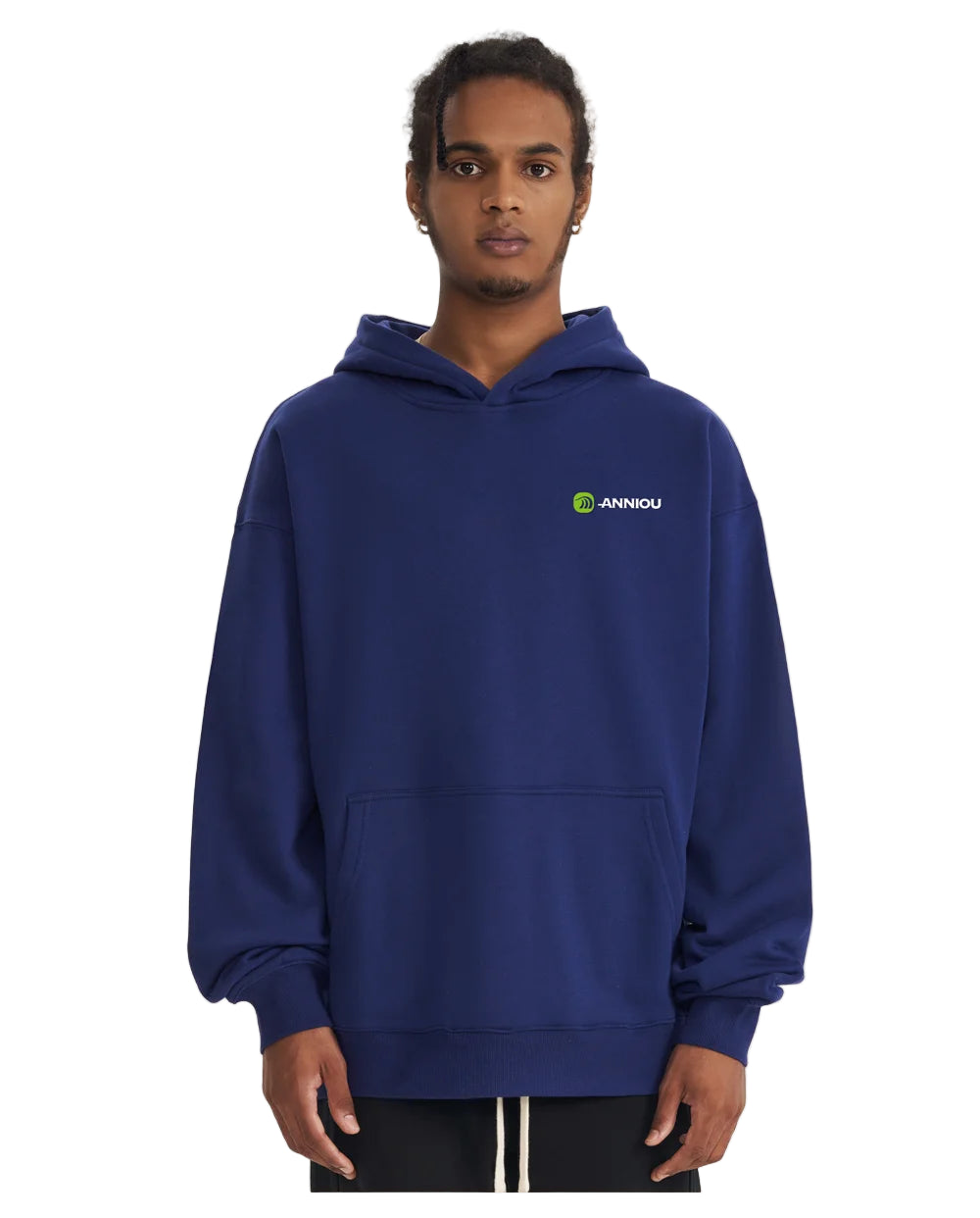 Person wearing a blue hoodie with a anniou logo on a beige background
