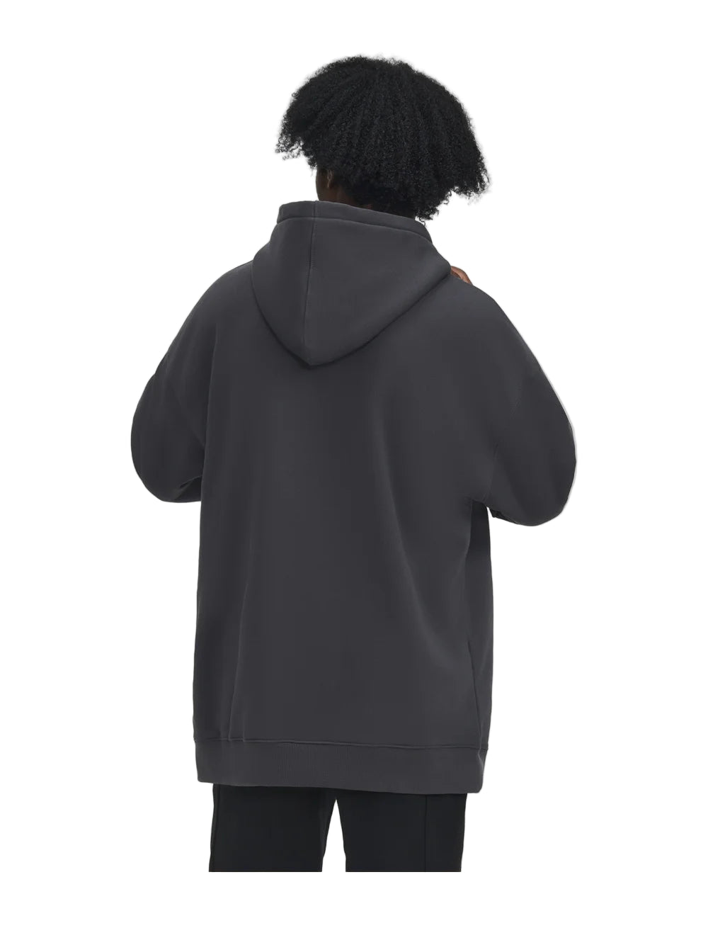 Person wearing a dark gray hoodie from behind on a light gray background