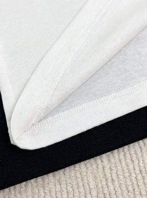 Hem detail of Heart Embroidered Long Sleeve Top