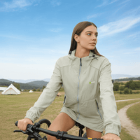 A woman was cycling outdoors wearing a sun protection jacket