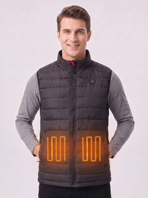 Smiling male model in black heated vest, glowing heating elements on waist, men’s electric warm gilet studio shot