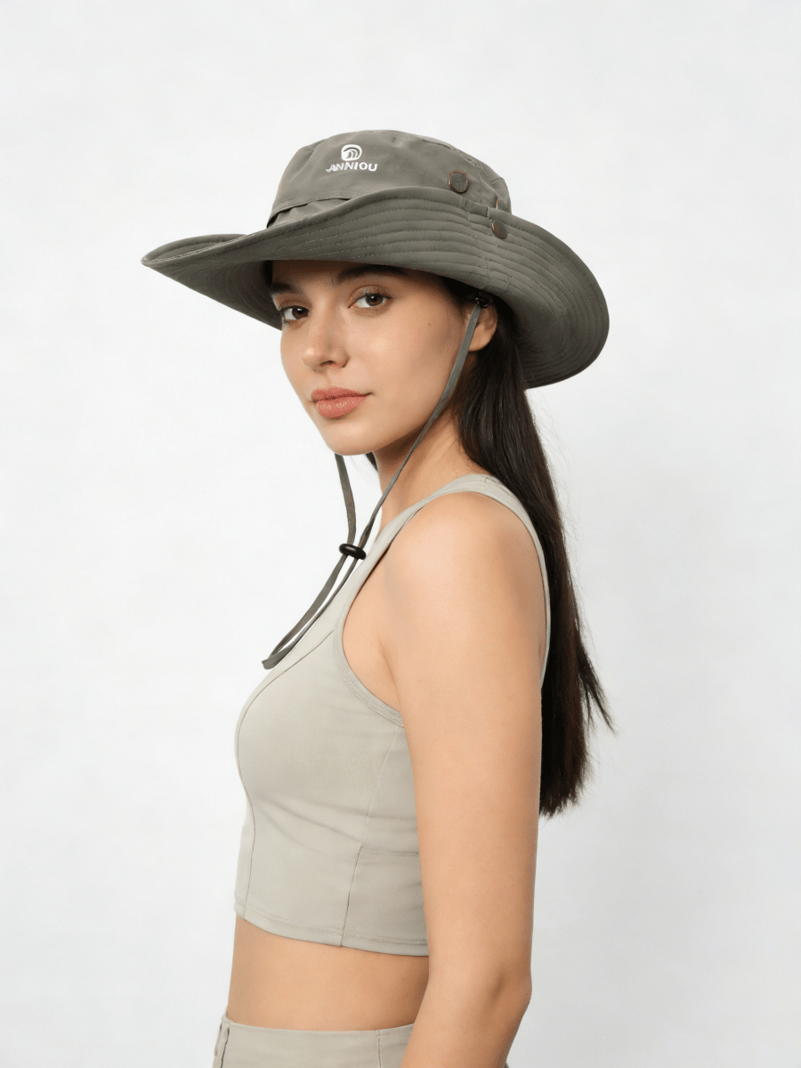 Woman wearing a wide-brimmed hat on a white background