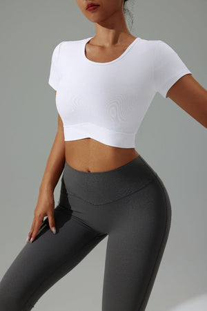#White short sleeve yoga top and gray leggings