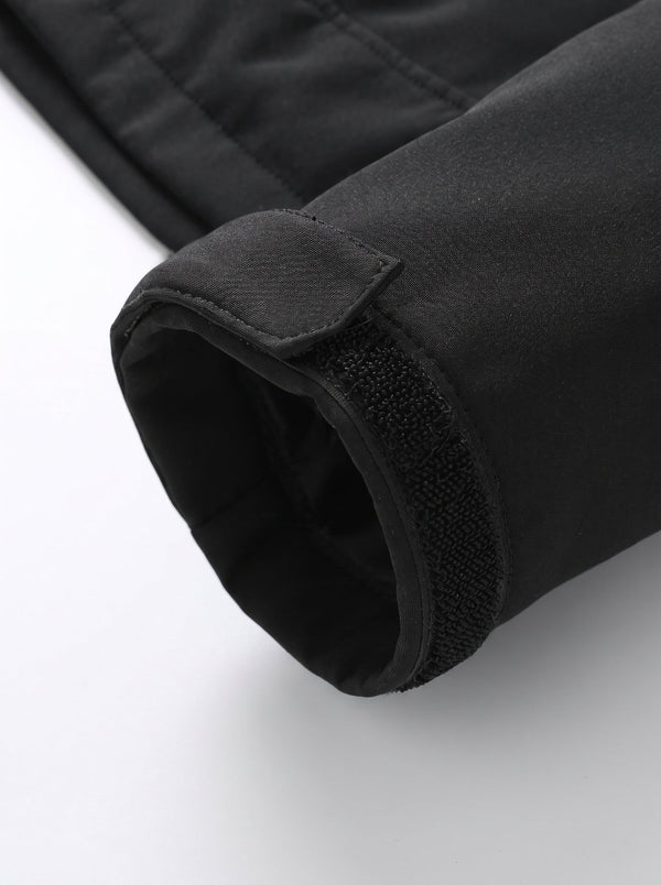 Hook and loop adjustable cuffs on heated softshell jacket