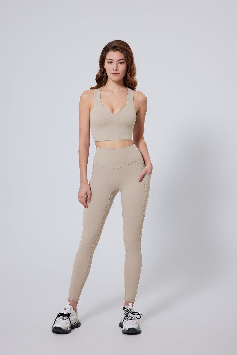 beige high waisted peach hip yoga leggings and sports vest