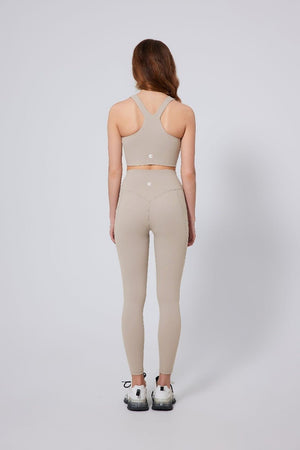 #beige high waisted peach hip yoga leggings and tank top