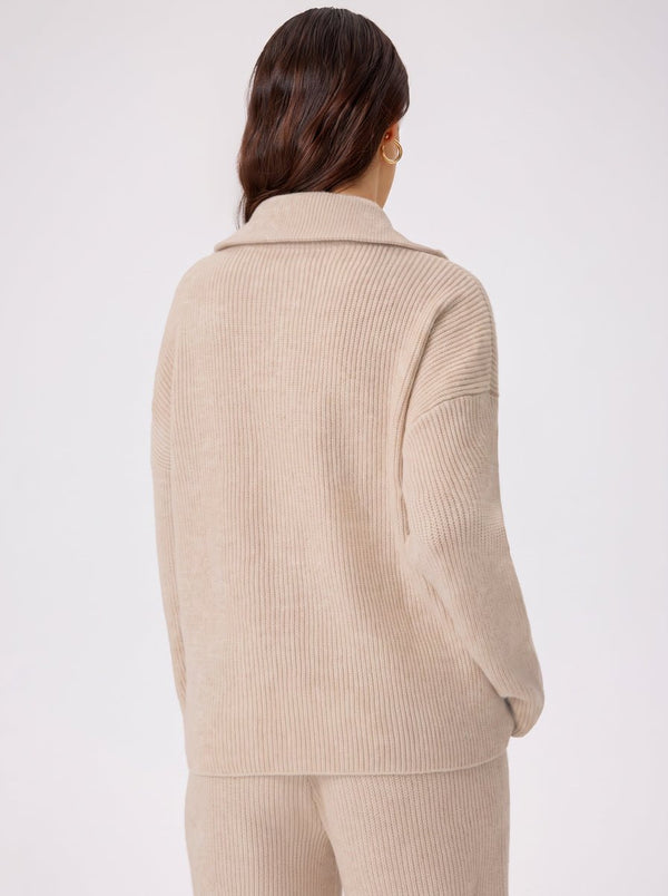 #beige rib knit sweater of back view