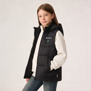A young girl wearing a black insulated sleeveless heated puffer vest