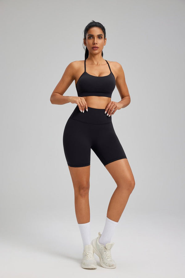 women's #black sports bra and high-waisted shorts