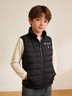 boy wearing a black Anniou heated puffer vest with zip.
