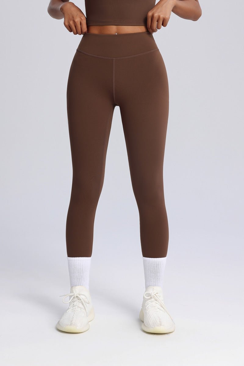 brown lycra yoga leggings and vest