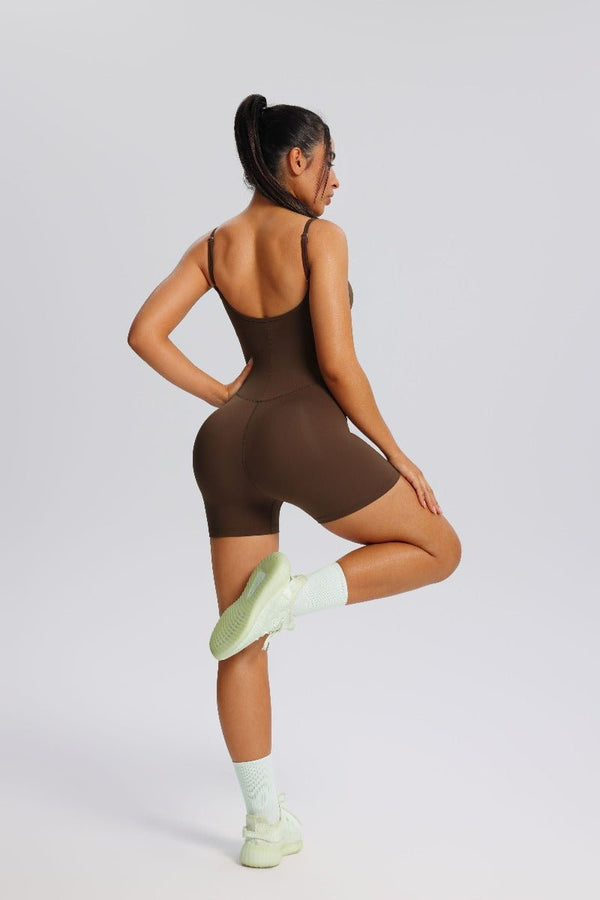 Woman wearing a #brown bodysuit 