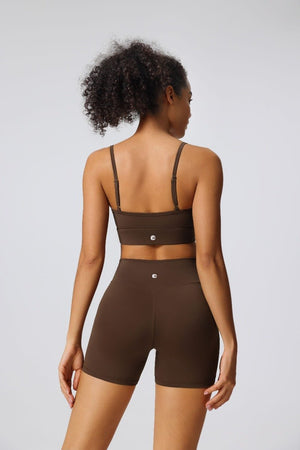 Woman wearing a adjustable Anniou logo #brown sports bra and Anniou logo yoga shorts 