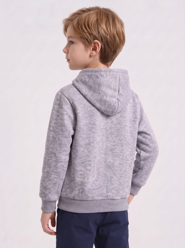 8-9 year old Caucasian boy model in side-back view, wearing heather grey marled fleece kids heated hoodie