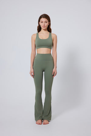 #green high waisted bootcut yoga leggings and sports bra