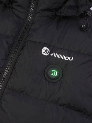 Close-up of a black puffer jacket with a white ANNIOU logo and a circular black control button with a glowing green light on the chest.