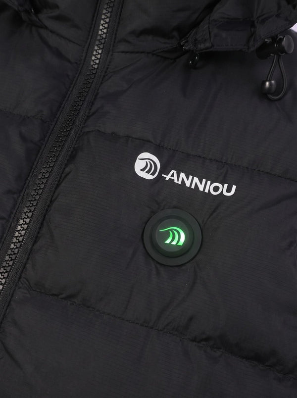 Close-up of a black puffer jacket with a white ANNIOU logo and a circular black control button with a glowing green light on the chest.