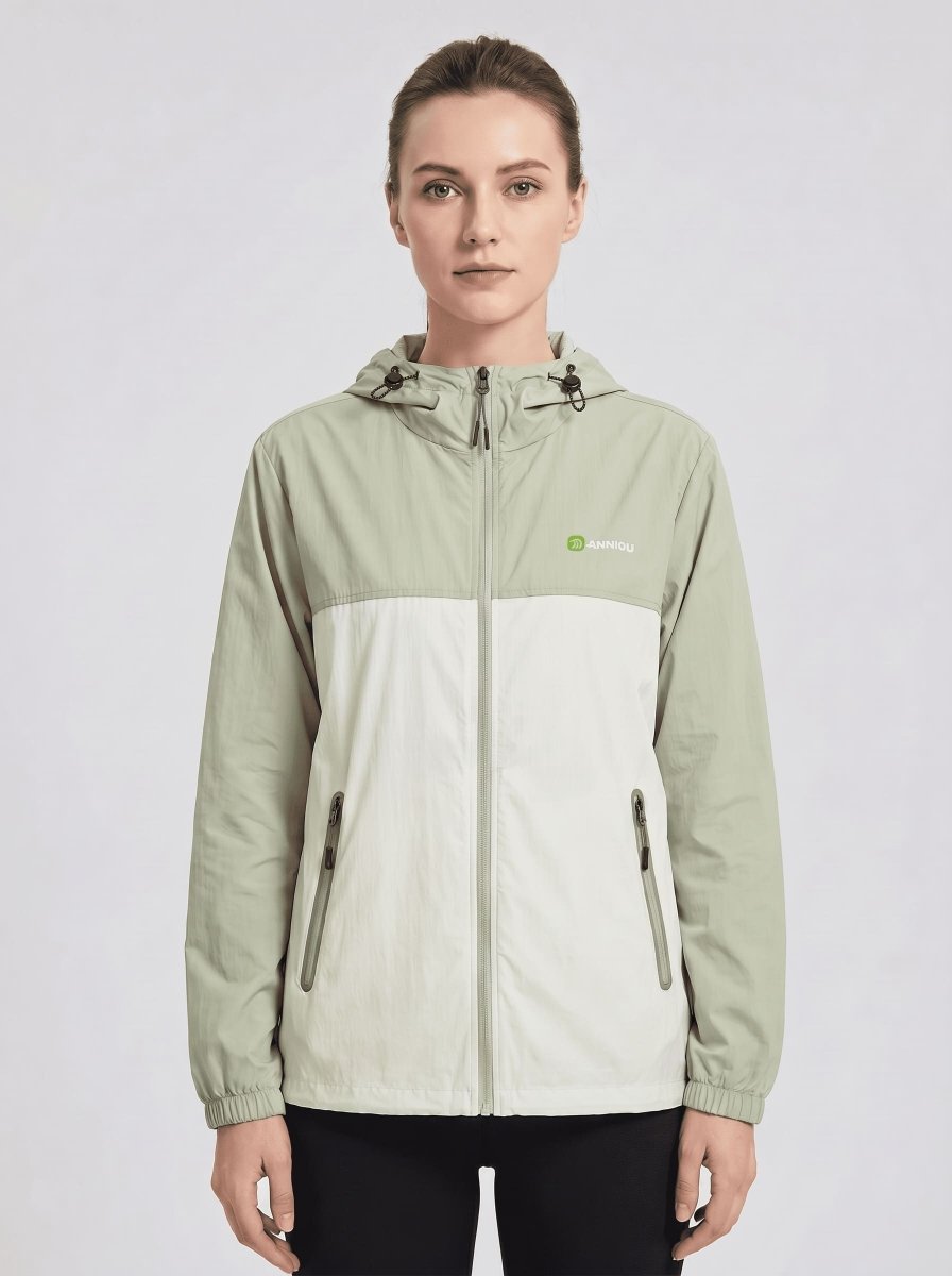 women's Lightweight Breathable UV Jacket with a hooded color-blocked design in #lightgreen and off-white, featuring a full front zipper, zippered hand pockets, and a small green logo on the left chest.