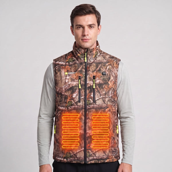 Front view of young British male model in woodland camo heated vest, bright orange glowing heating pads on abdomen