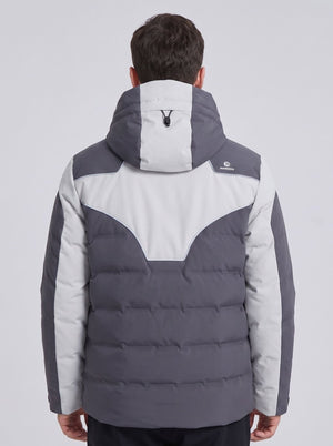 A man viewed from the back wearing a colorblock heated ski puffer jacket in dark gray and light gray, with a hood.