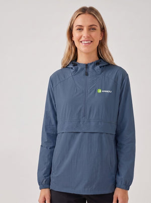 A woman wearing a #navy blue hooded UV jacket with a half-zip front and a small green and white Anniou logo on the left chest, photographed against a neutral light gray studio background.