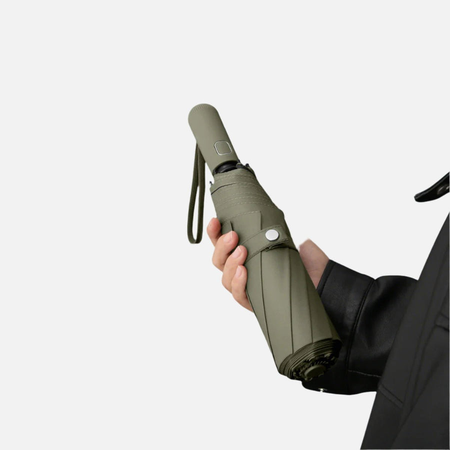 man holding a Sun Protective Automatic Umbrella UPF 50+ with push button