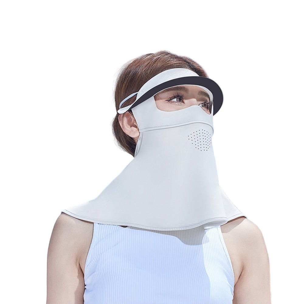 Person wearing a white UV face mask with a visor on a white background