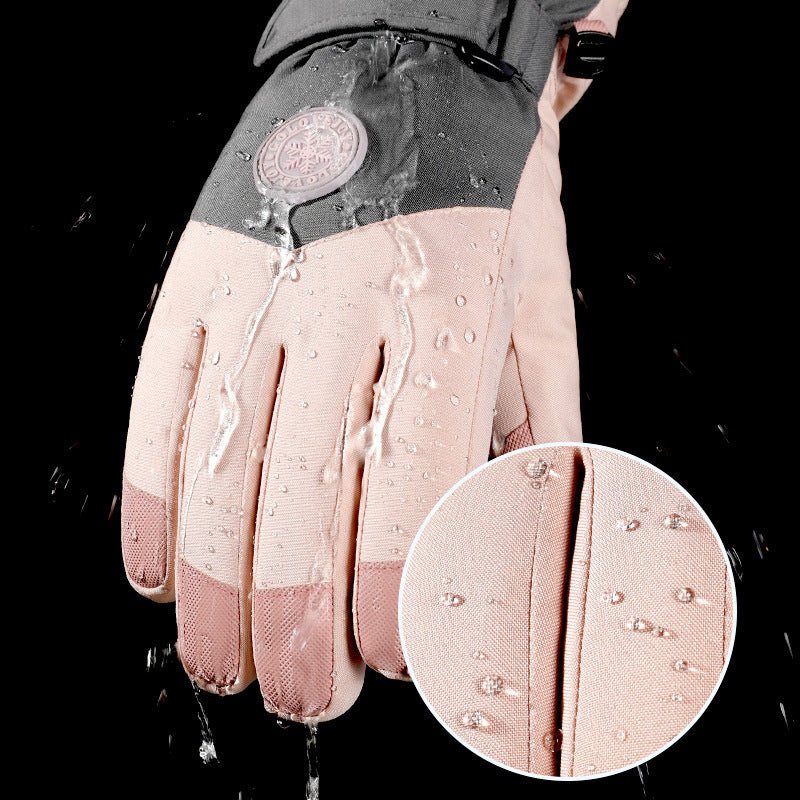 Pink gloves with water droplets on a black background