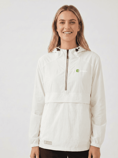 A woman wearing a #white hooded lightweight UV jacket with a half-zip front, black drawstrings, and a small green logo on the left chest, photographed against a plain light gray studio background.