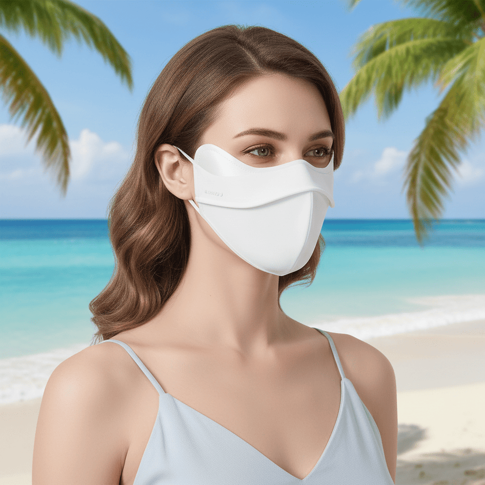 Woman wearing a white face mask on a tropical beach with palm trees and clear blue water.